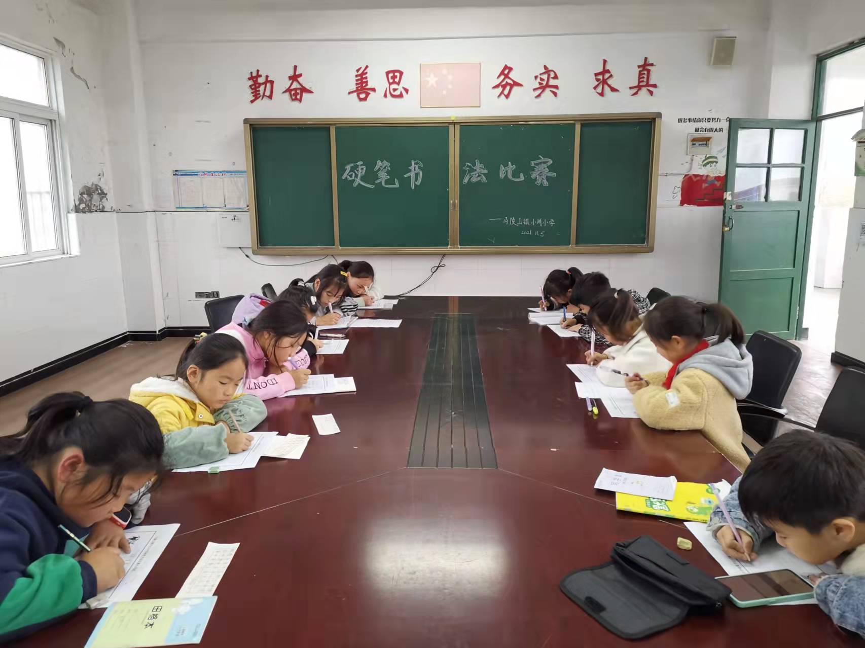 书写精彩人生——马陵山镇小周小学硬笔书法比赛活动